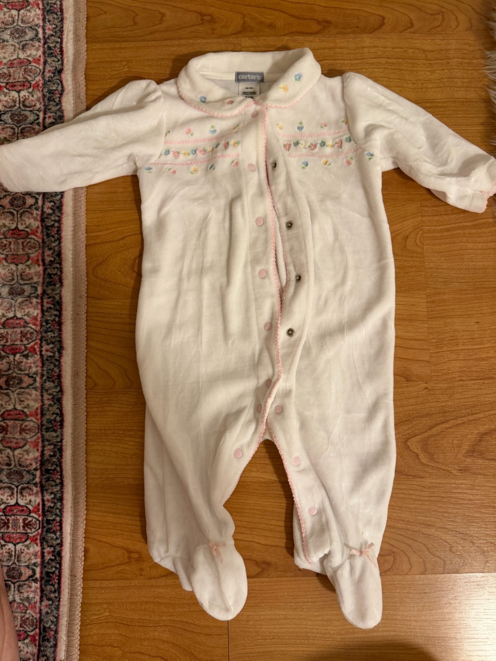 Carters White Floral Trim Onesie *Stain on back*